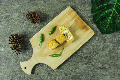 High angle view of fruits on cutting board