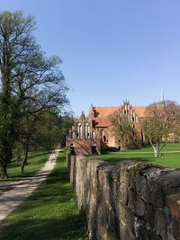 View of old building against clear blue sky