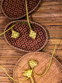 High angle view of fruits in basket on table