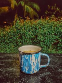 Close-up of coffee cup on table