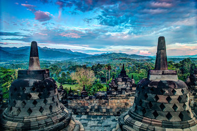 Ancient temple against building