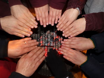 High angle view of people holding hands