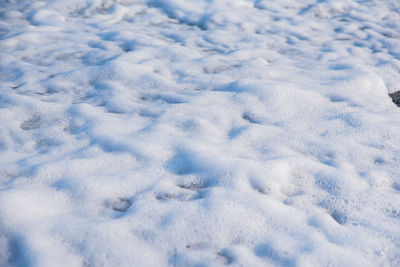 Full frame shot of snow covered field