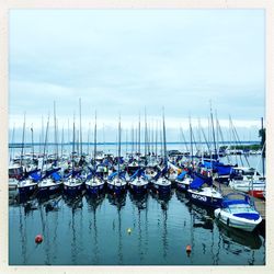 Boats moored in sea