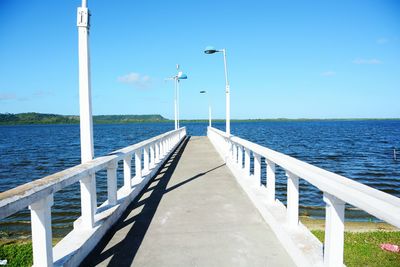 Scenic view of sea against blue sky