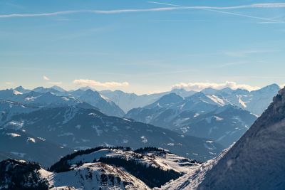 Scenic view of snowcapped mountains against sky