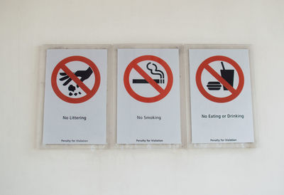 Close-up of warning sign on wall