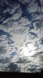 Scenic view of landscape against cloudy sky