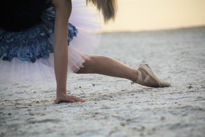 Low section of woman on beach