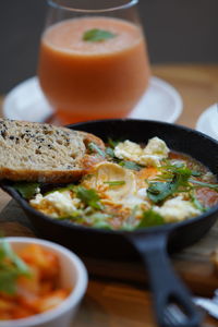 Close-up of soup served on table