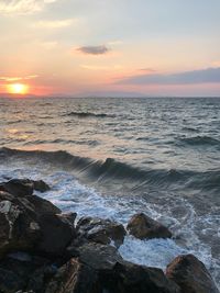 Scenic view of sea against sky during sunset