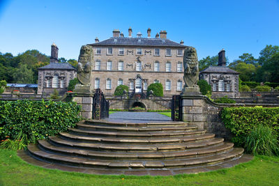 Staircase of building against clear blue sky