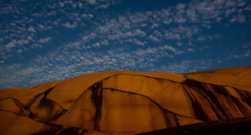 Tent in desert against sky