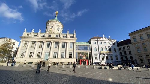 Group of people in front of building