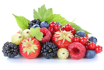 Close-up of fruits against white background