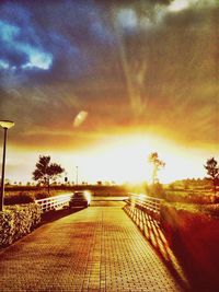 Empty road at sunset