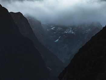 Scenic view of mountains against sky during winter