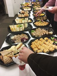 Midsection of man preparing food