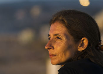 Close-up of woman looking away