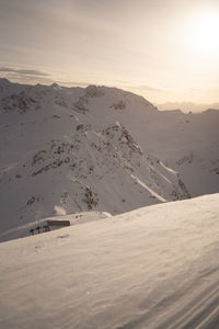 Scenic view of desert against sky during sunset
