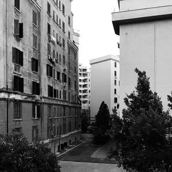 Buildings in city against sky