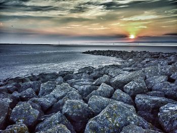 Scenic view of sea against sky during sunset