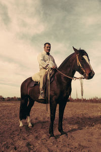 Man horseback riding equestrian sport