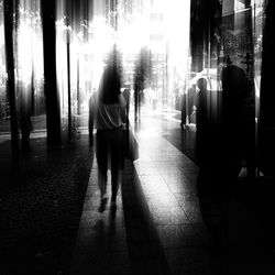 Full length of woman standing in park