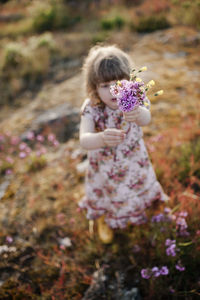 Girl picking flowers