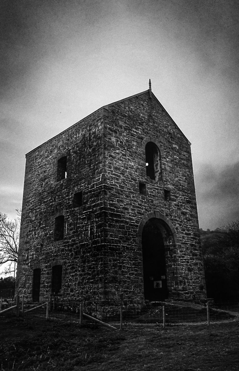 LOW ANGLE VIEW OF BELL TOWER AGAINST THE SKY