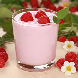 Close-up of strawberries in glass on table