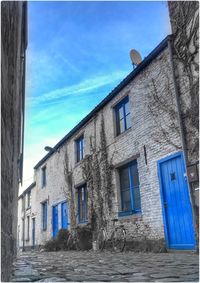 Buildings against blue sky