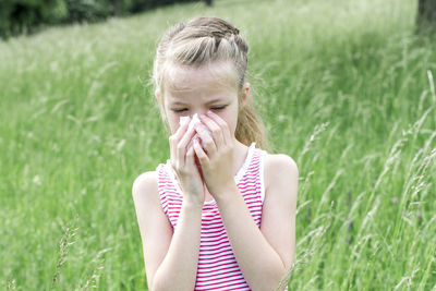 Girl wearing hat on field