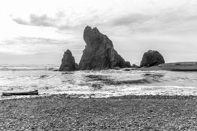 A natural rock monolith at ruby beach in washington state.