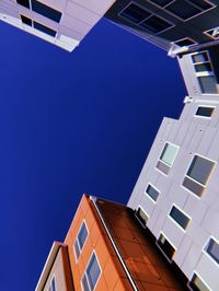 Low angle view of building against clear blue sky