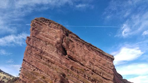 Low angle view of vapor trail against sky