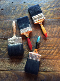 Close-up of paintbrushes on table