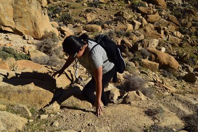 Man standing on rock