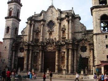 Tourists in front of building