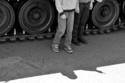 Low section of man standing on floor