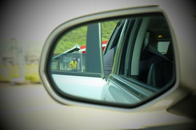 Reflection of car on road