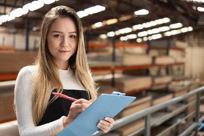 Young woman using digital tablet