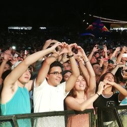 High angle view of people enjoying music concert at night