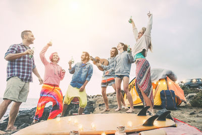 Cheerful people enjoying on the beach