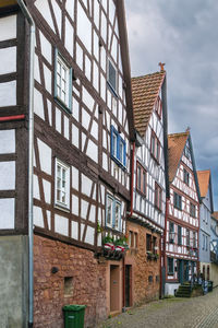 Street with historical half-timbered houses in budingen, hesse, germany