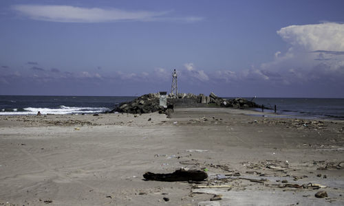 Scenic view of beach against sky