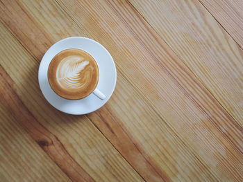 High angle view of cappuccino on table