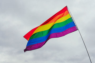 Low angle view of flag against sky