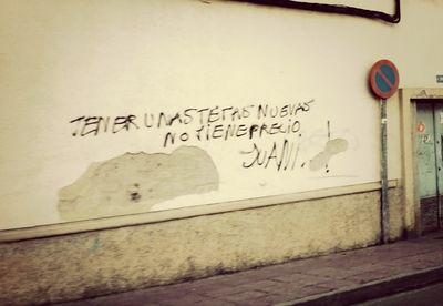 Close-up of text on wall