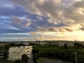 Scenic view of dramatic sky over city